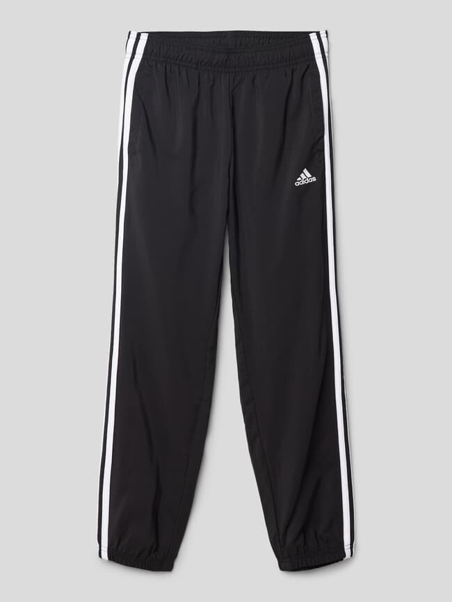 

Спортивные брюки с принтом этикеток ADIDAS SPORTSWEAR, черный