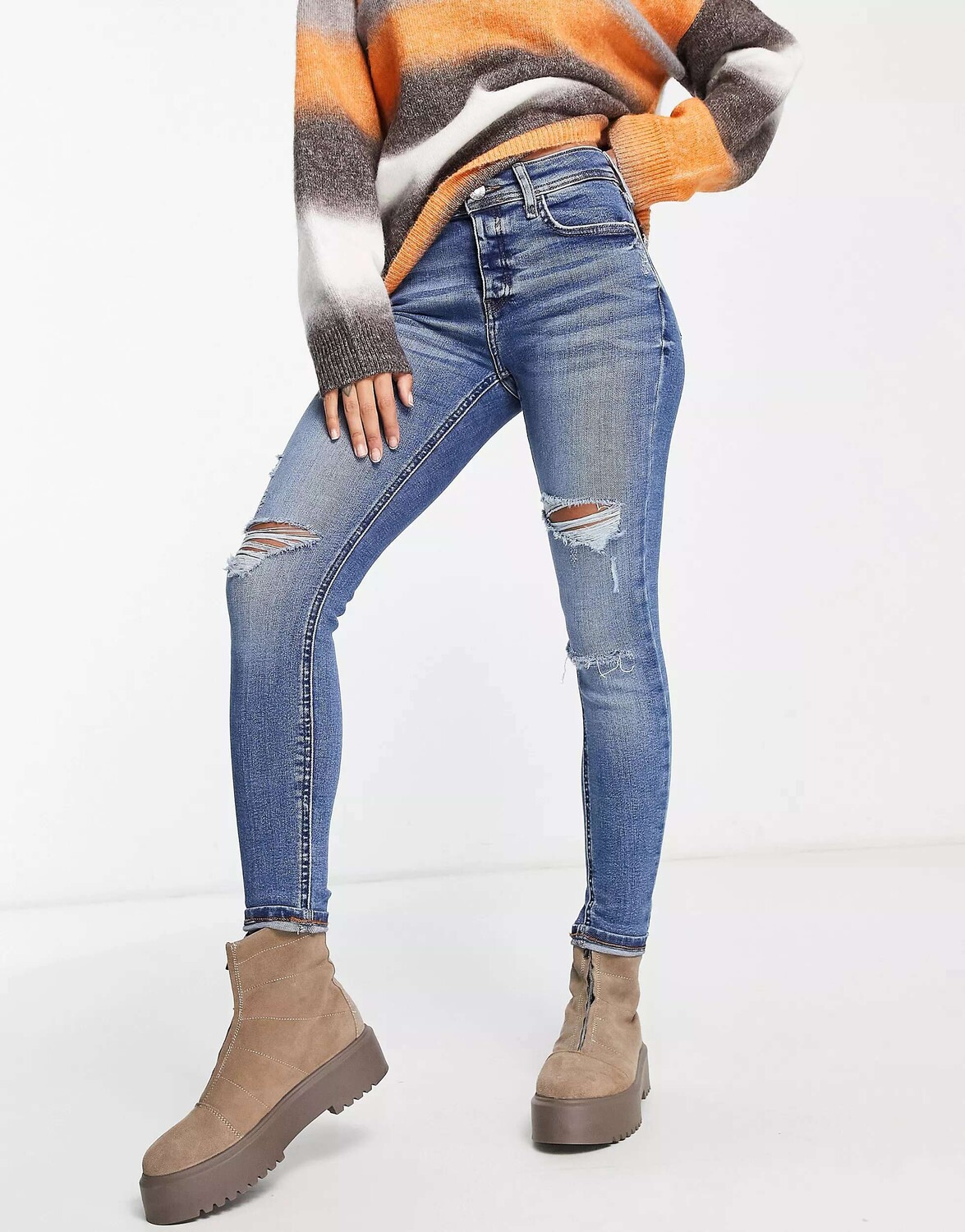 

Темно-синие джинсы скинни со средней посадкой и рваными краями River Island