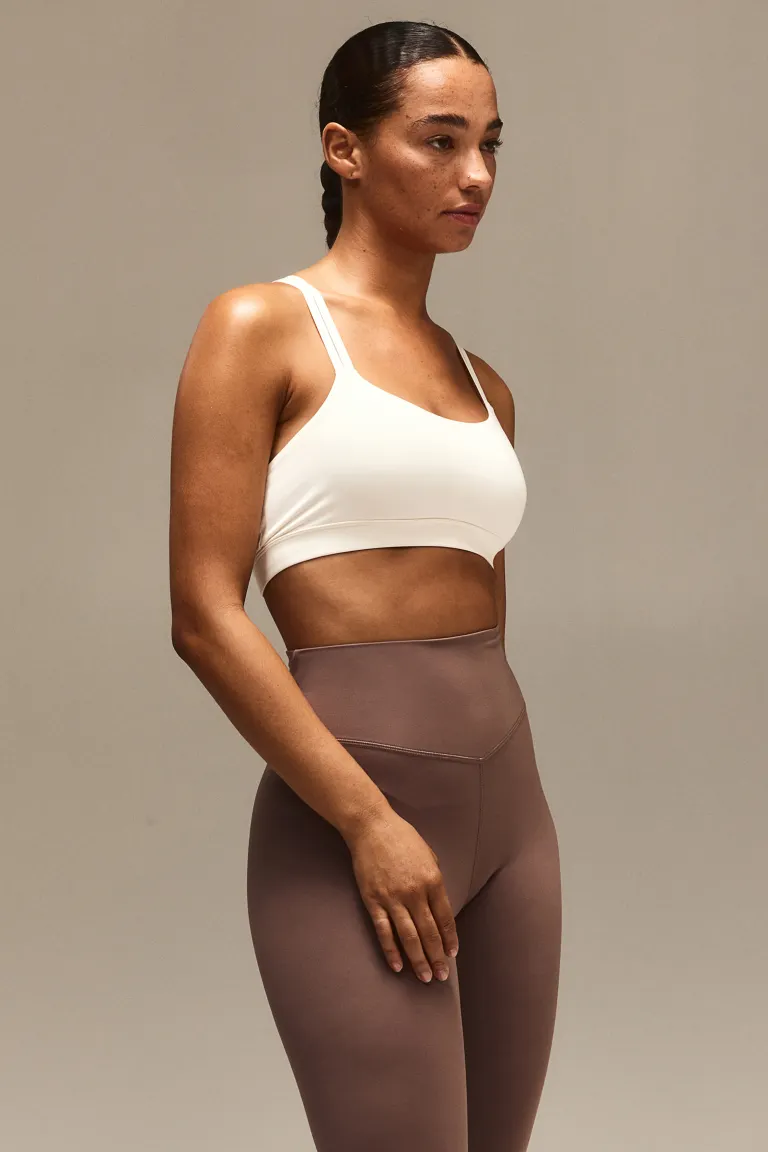 

Спортивный бюстгальтер light support от softmove H&M, белый