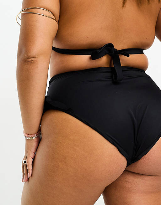 

Черные плавки бикини с завышенной талией и оборками ASOS DESIGN Curve
