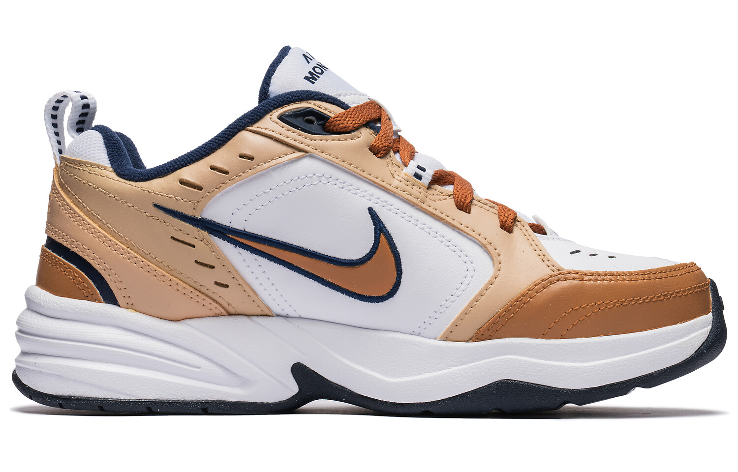 

Кроссовки Air Monarch 4 Chunky унисекс с низким верхом коричневого цвета Nike