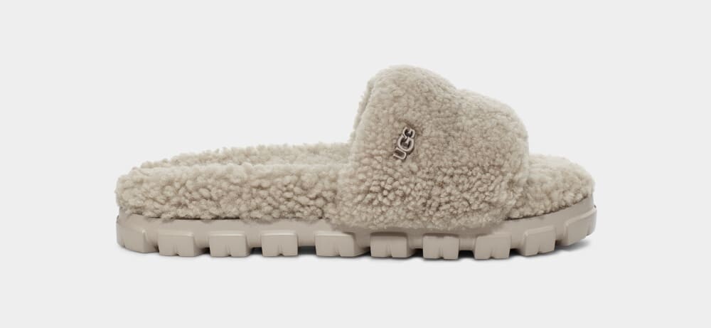 

Домашние тапочки Cozetta Curly UGG, зеленый