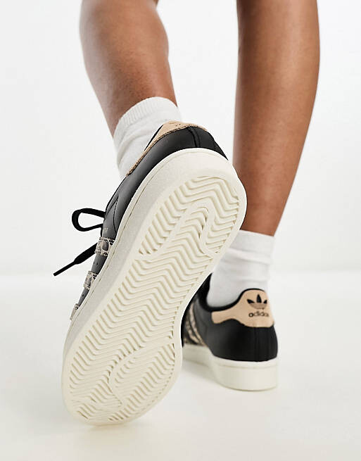 

Черные кроссовки с леопардовым принтом adidas Originals Superstar