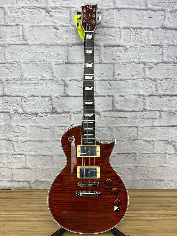 

Электрогитара ESP LTD EC-1000 FM Fluence 2019 - 2020 - Tiger Eye
