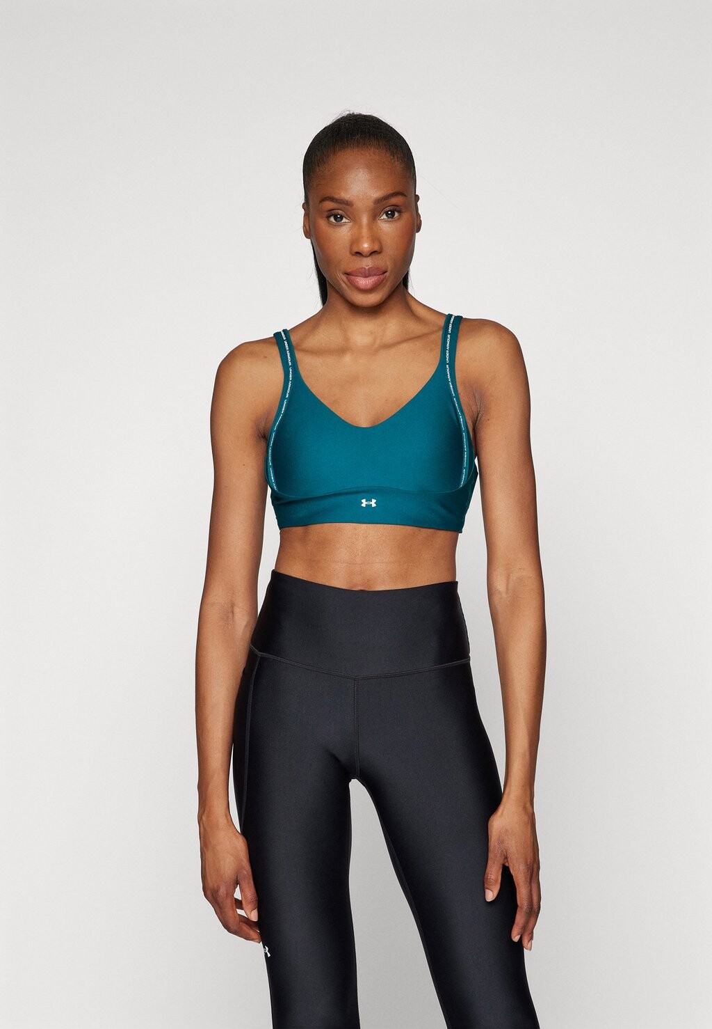 

Спортивный бюстгальтер с легкой поддержкой. Under Armour, бирюзовый