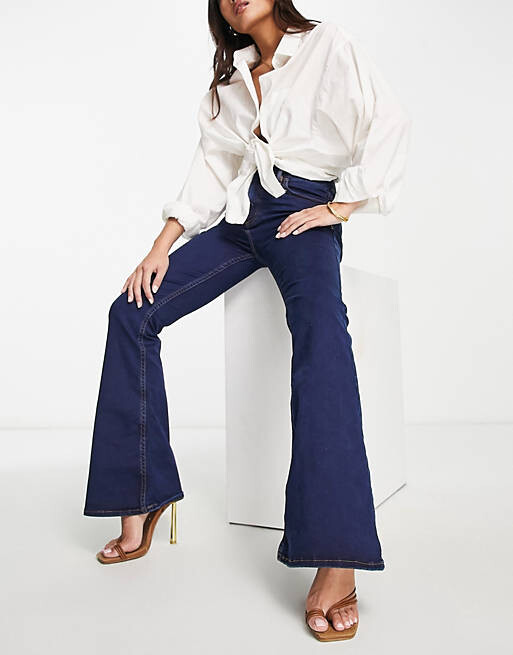 

Темно-синие расклешенные джинсы ASOS DESIGN Petite Power
