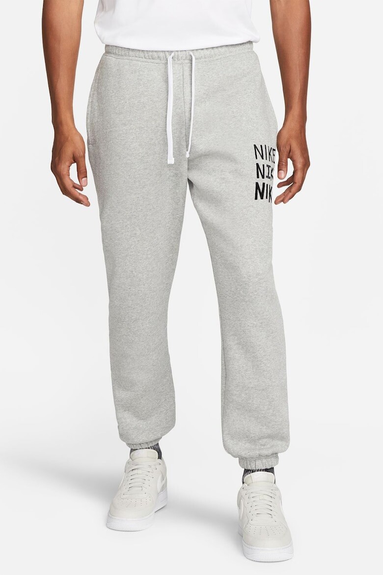 

Спортивные брюки с логотипом и галстуком Nike, серый