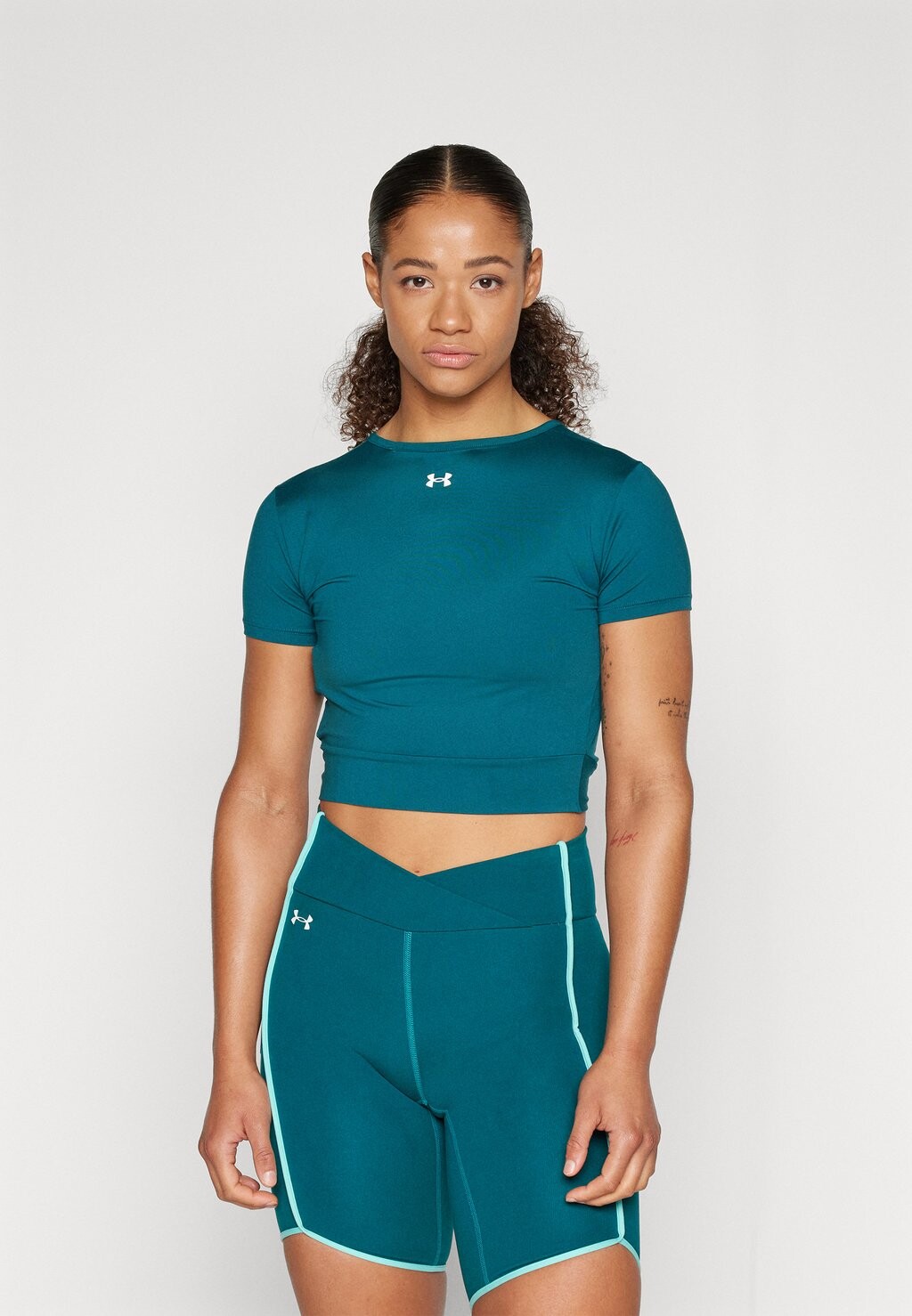 

Футболка с принтом MOTION CROSSOVER CROP Under Armour, цвет hydro teal/white