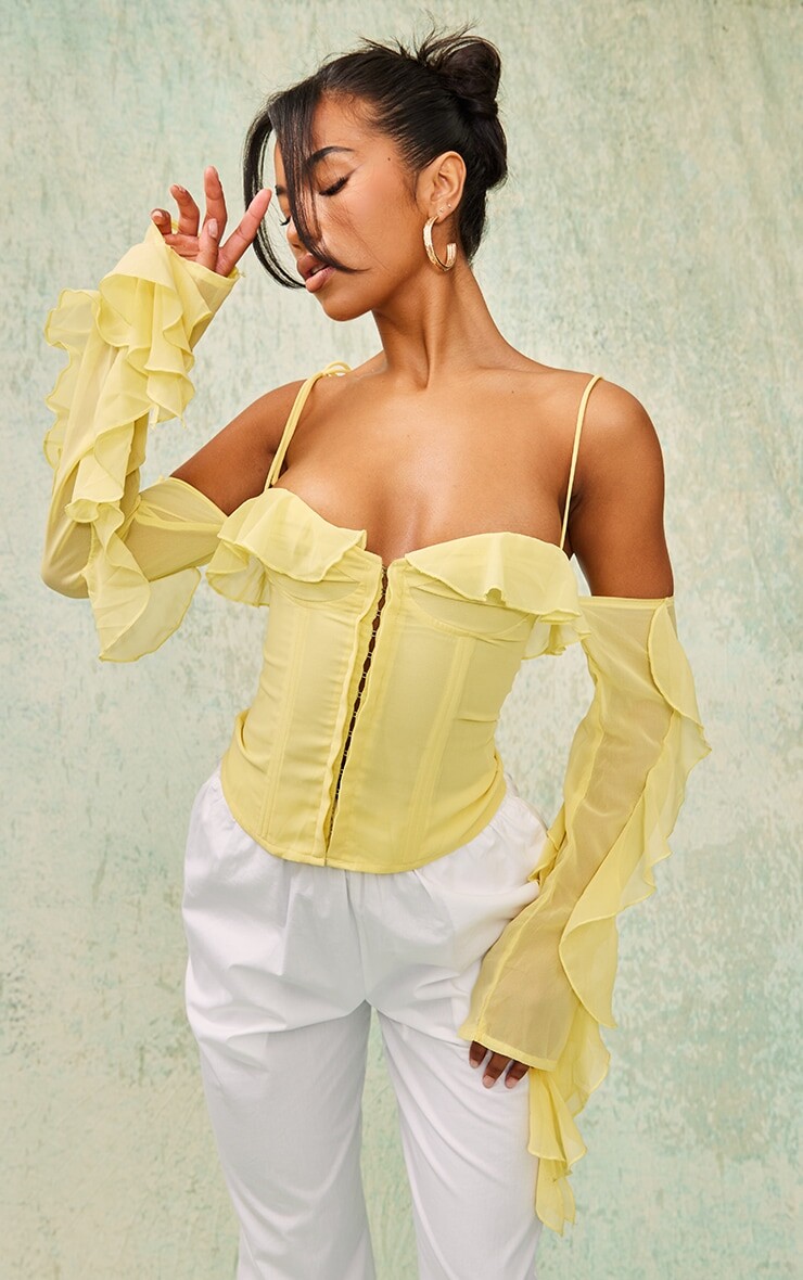 

PrettyLittleThing Тканый корсет с крючками и оборками на косточке лимонного цвета