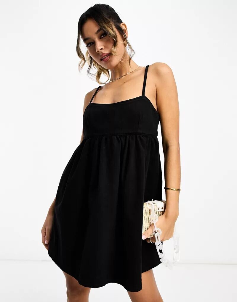 

Черное джинсовое платье мини на бретельках ASOS