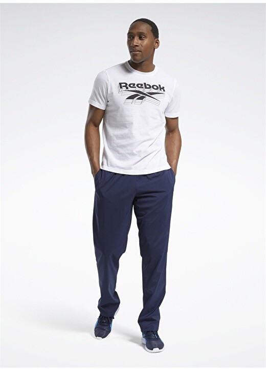 

Обычные однотонные темно-синие мужские спортивные штаны Reebok