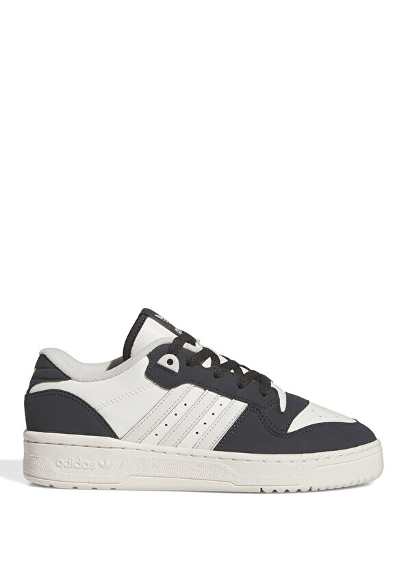 

Женские кожаные кроссовки rivalry low Adidas