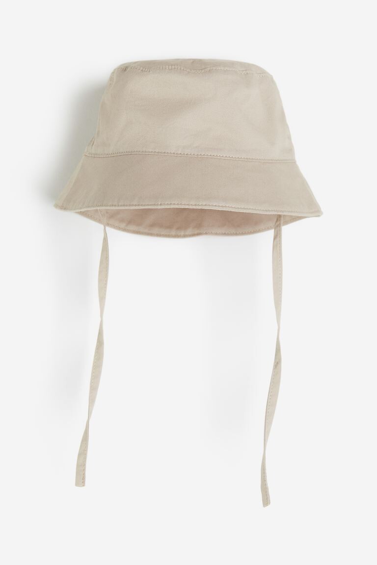 

Ведро изготовлено из хлопка H&M, бежевый