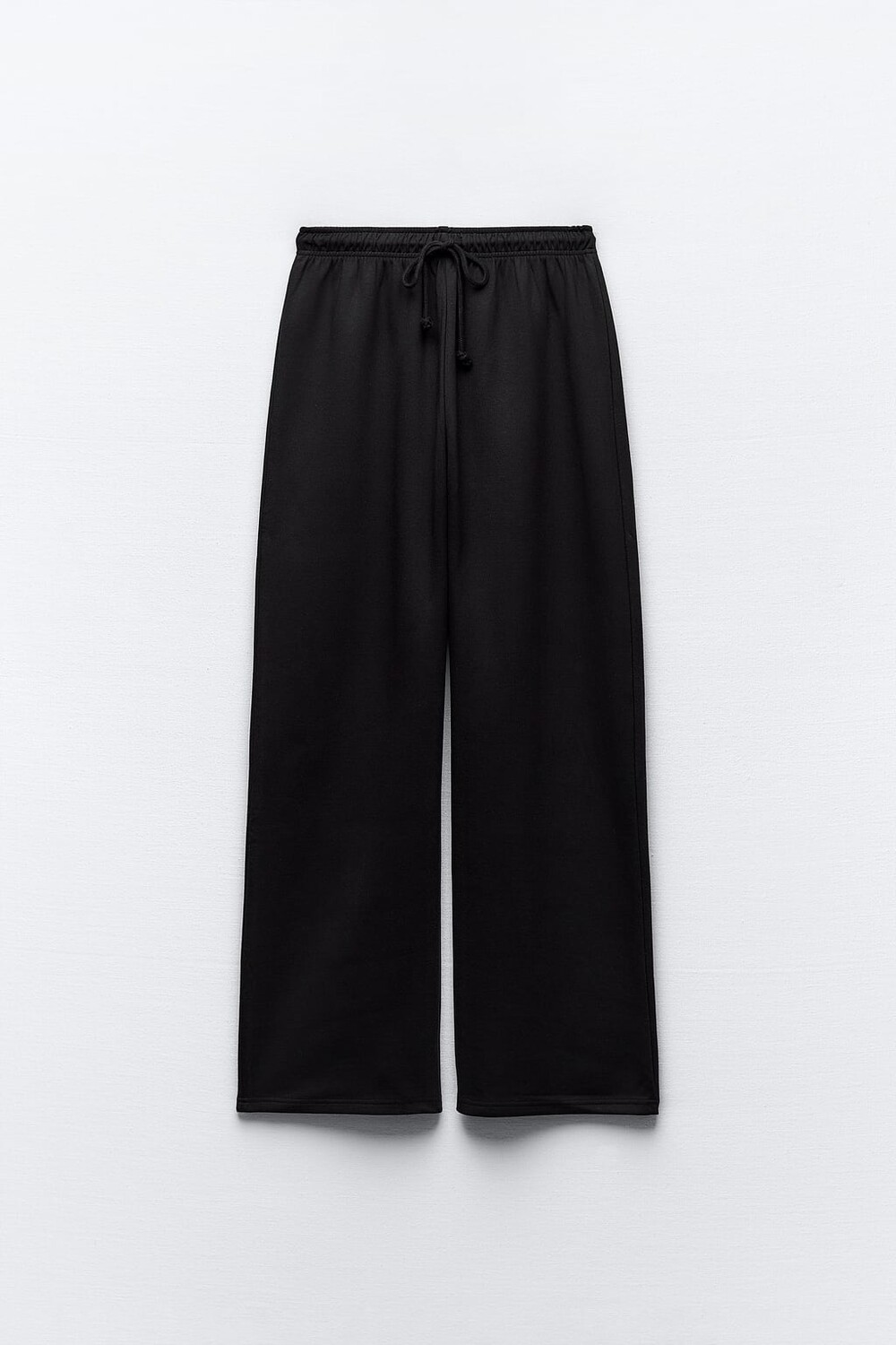

Плюшевые брюки прямого кроя из чистого интерлока. ZARA, черный