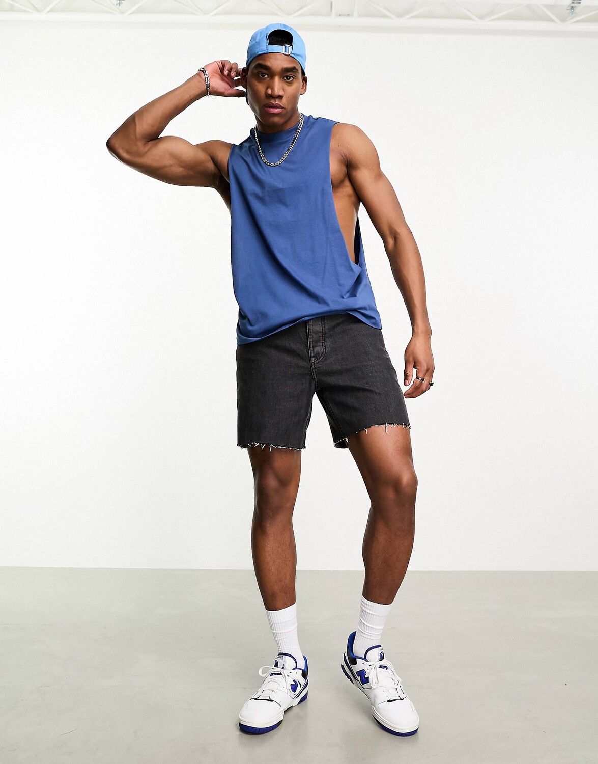 

Синий свободный жилет с заниженной проймой ASOS DESIGN