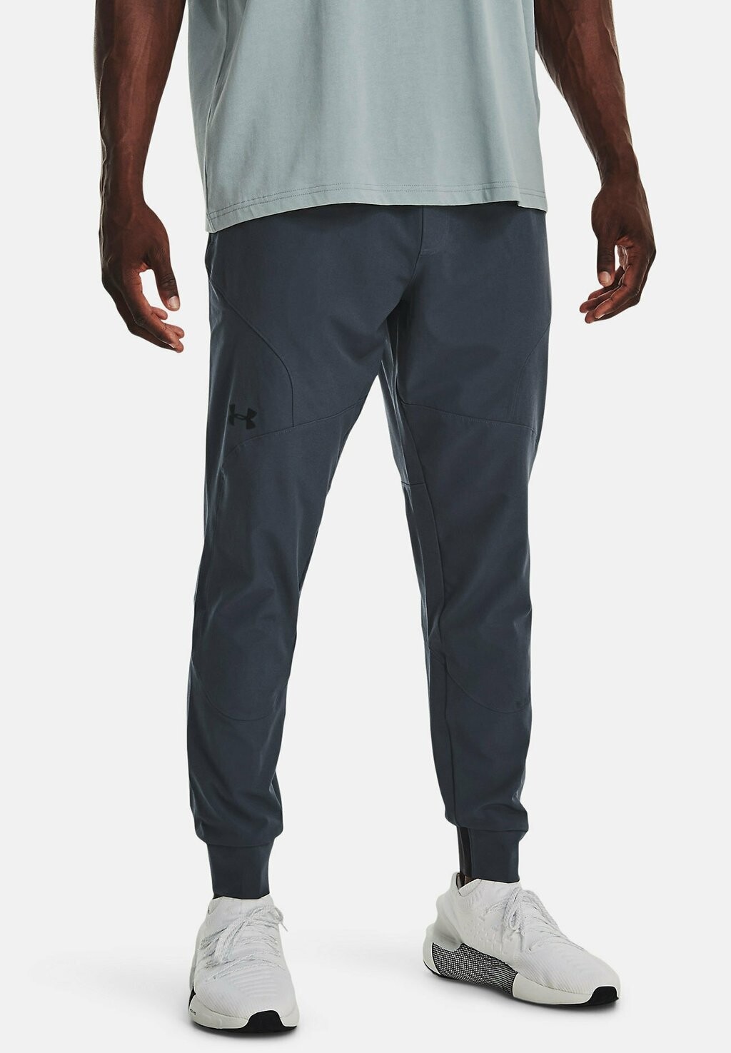 

Спортивные брюки UNSTOPPABLE JOGGERS Under Armour, серый ливень
