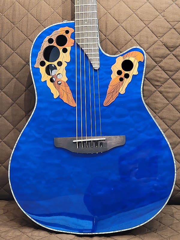 Акустическая гитара Ovation CE44P-8TQ Exotic Celebrity Elite Plus Selected Figured Top Mid-Depth Lyrachord Body Nato Neck 6-String Acoustic-Electric Guitar