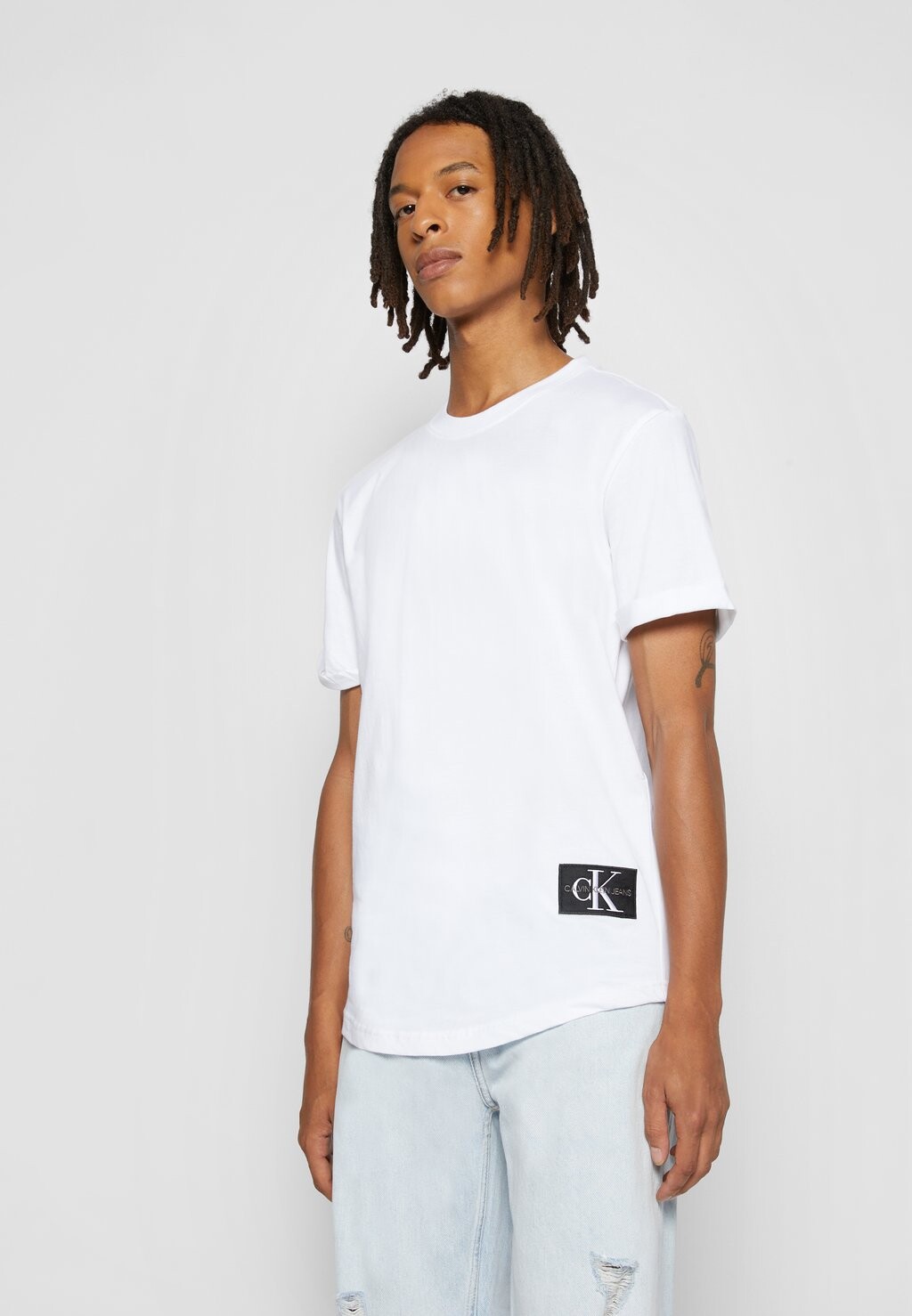 

Футболка с принтом Calvin Klein Jeans, белый