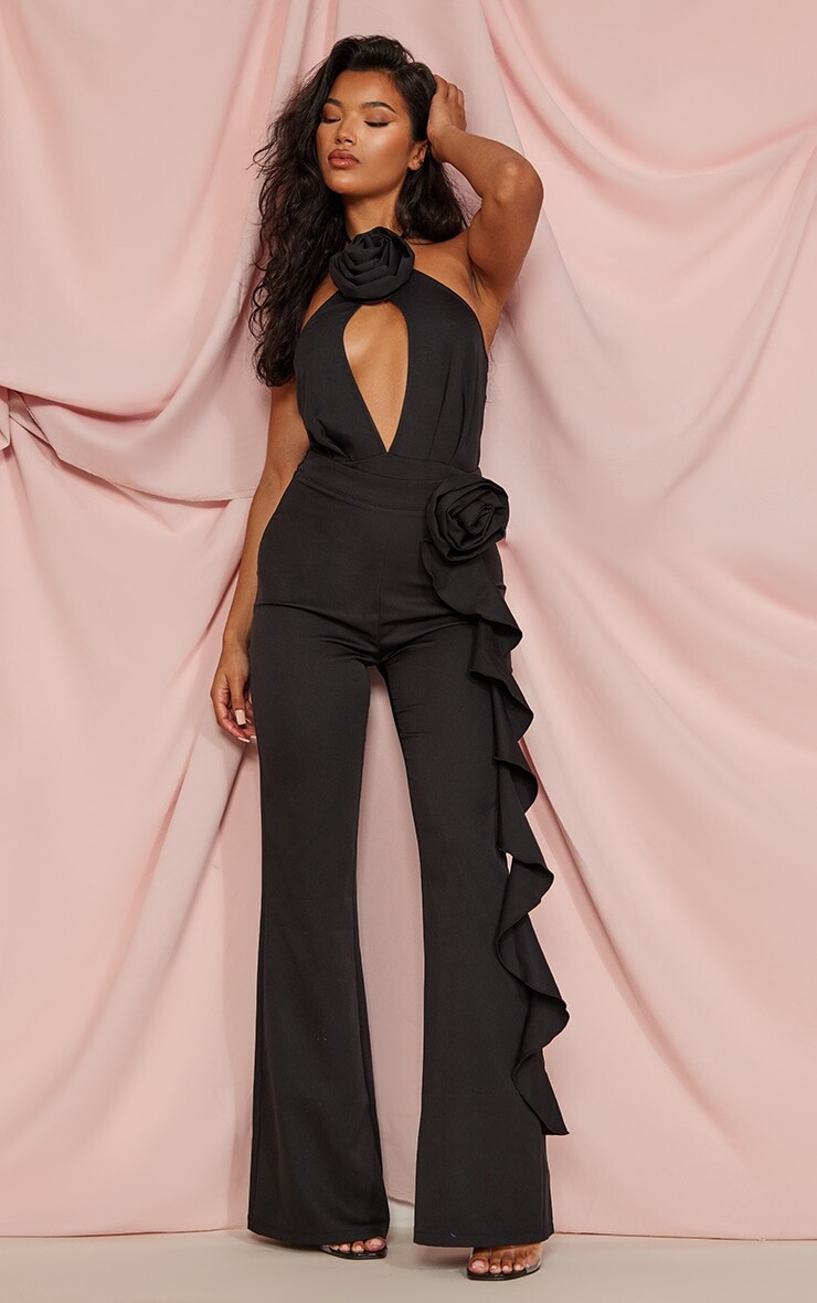 

PrettyLittleThing Черные расклешенные брюки с цветочной аппликацией