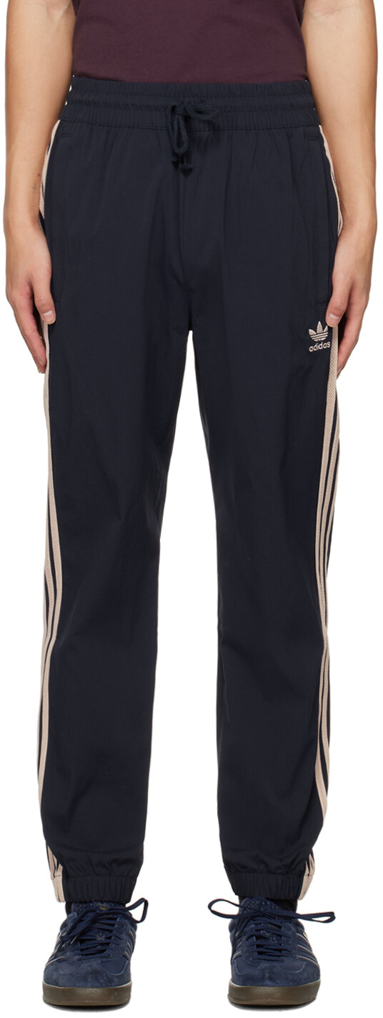 

Темно-синие спортивные брюки SST adidas Originals