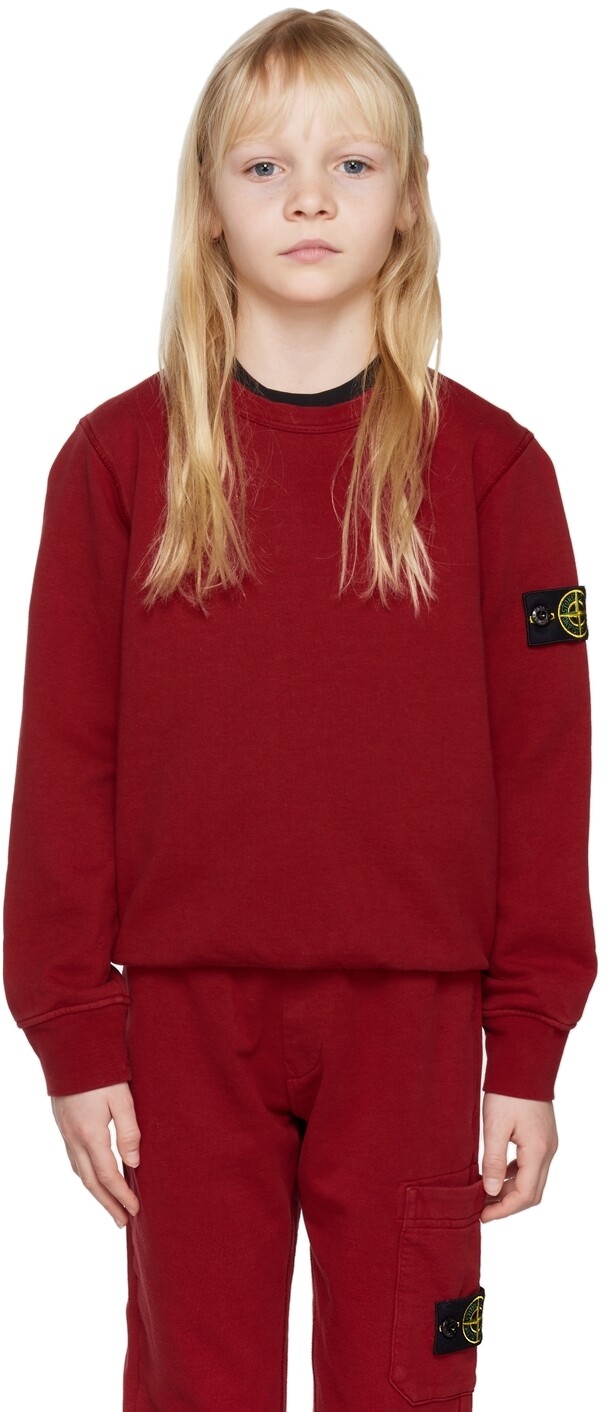 

Детская красная толстовка, окрашенная в одежде Stone Island Junior
