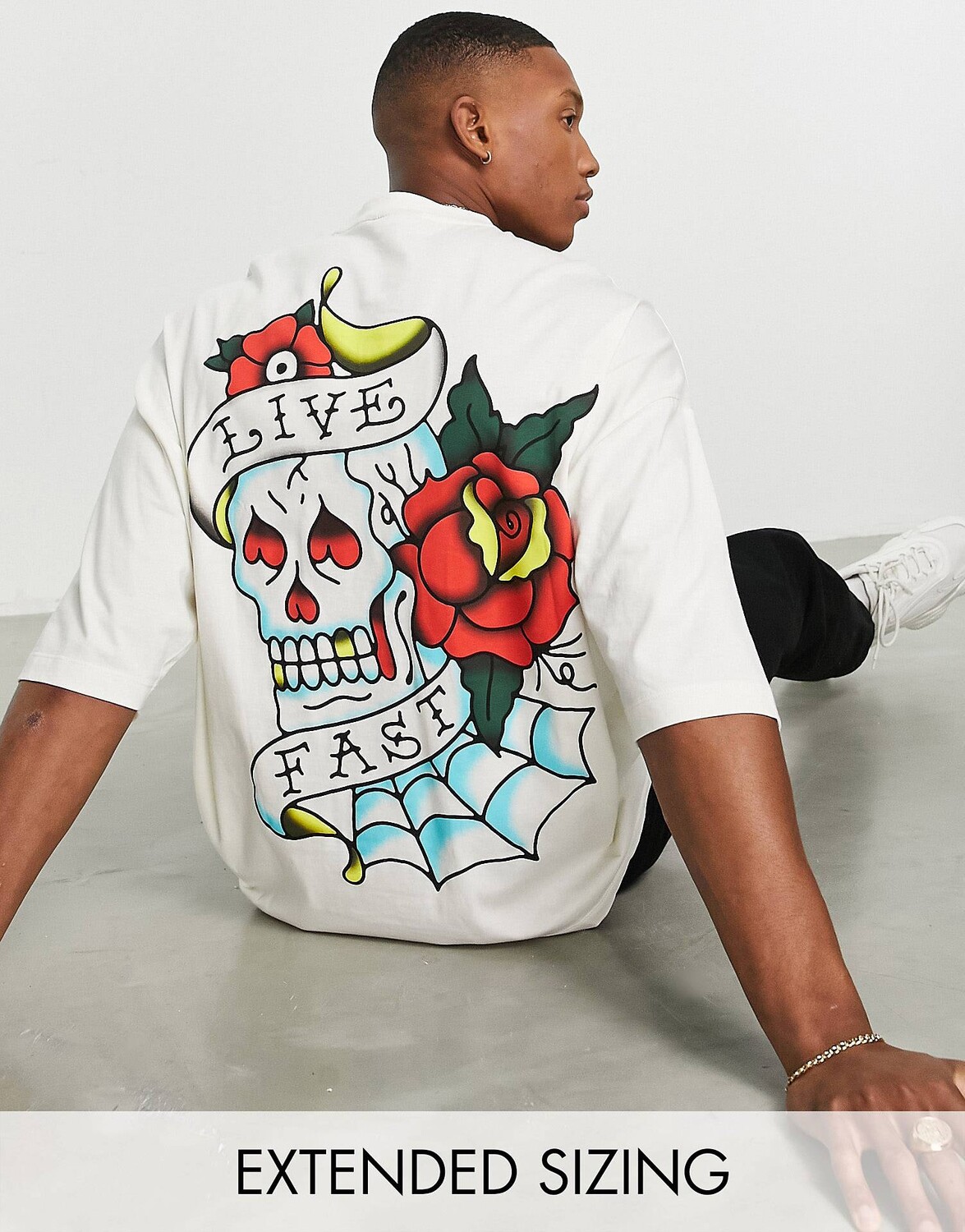 

Белая оверсайз-футболка с тату-черепом на спине ASOS DESIGN