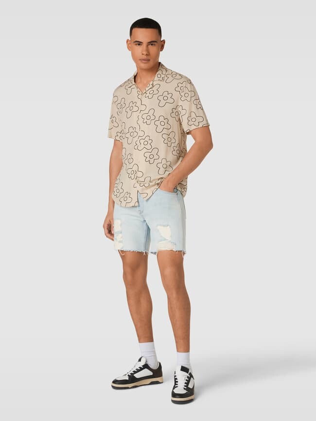 

Джинсовые шорты в потертом виде Levi's, джинс