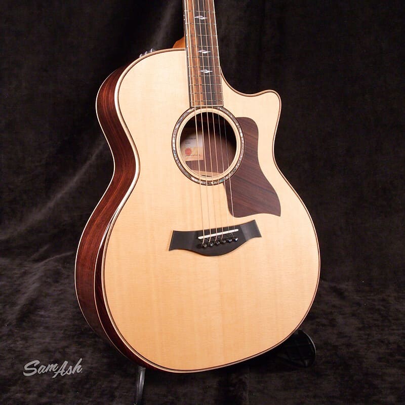 

Taylor 814CE V-КЛАСС АКУСТИЧЕСКАЯ ЭЛЕКТРИЧЕСКАЯ ГИТАРА С ПОДЛОКОТНИКОМ Taylor 814CE V-CLASS ACOUSTIC-ELECTRIC GUITAR WITH ARMREST