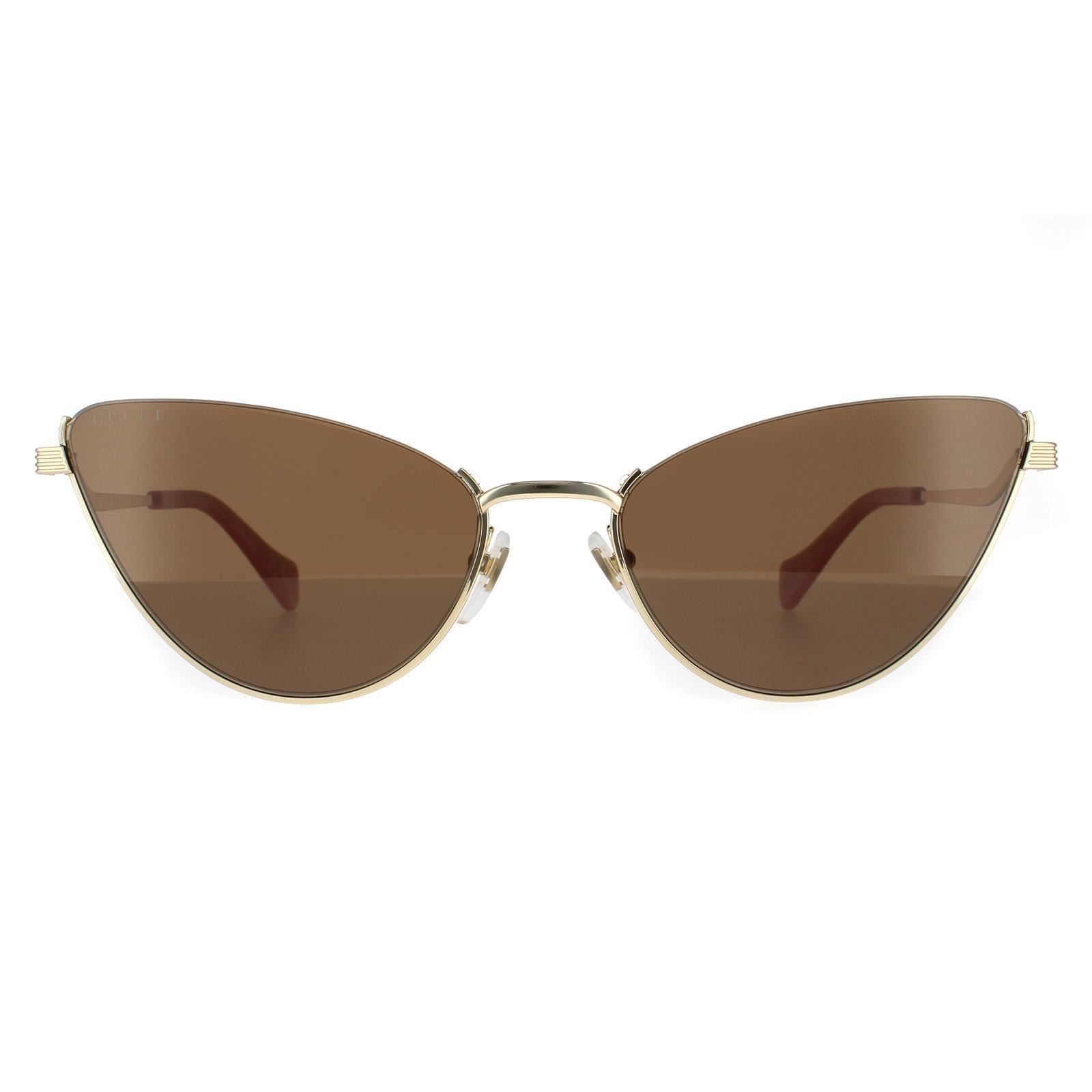 Золотисто-коричневые солнцезащитные очки «кошачий глаз» Gucci, золото цена и фото