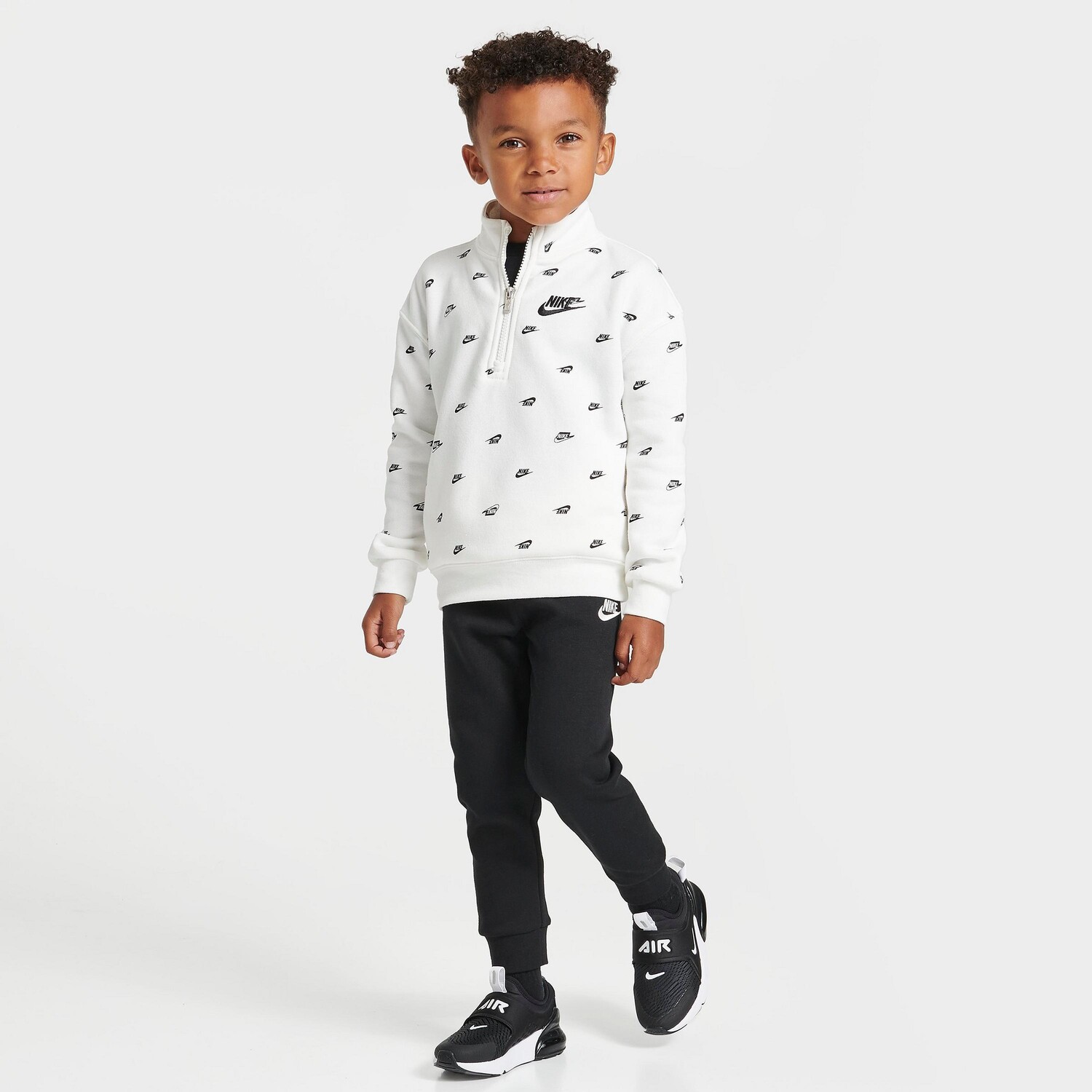 

Детский комплект из куртки с полумолнией до половины молнии Nike Allover Print Futura и брюк для бега для малышей, черный