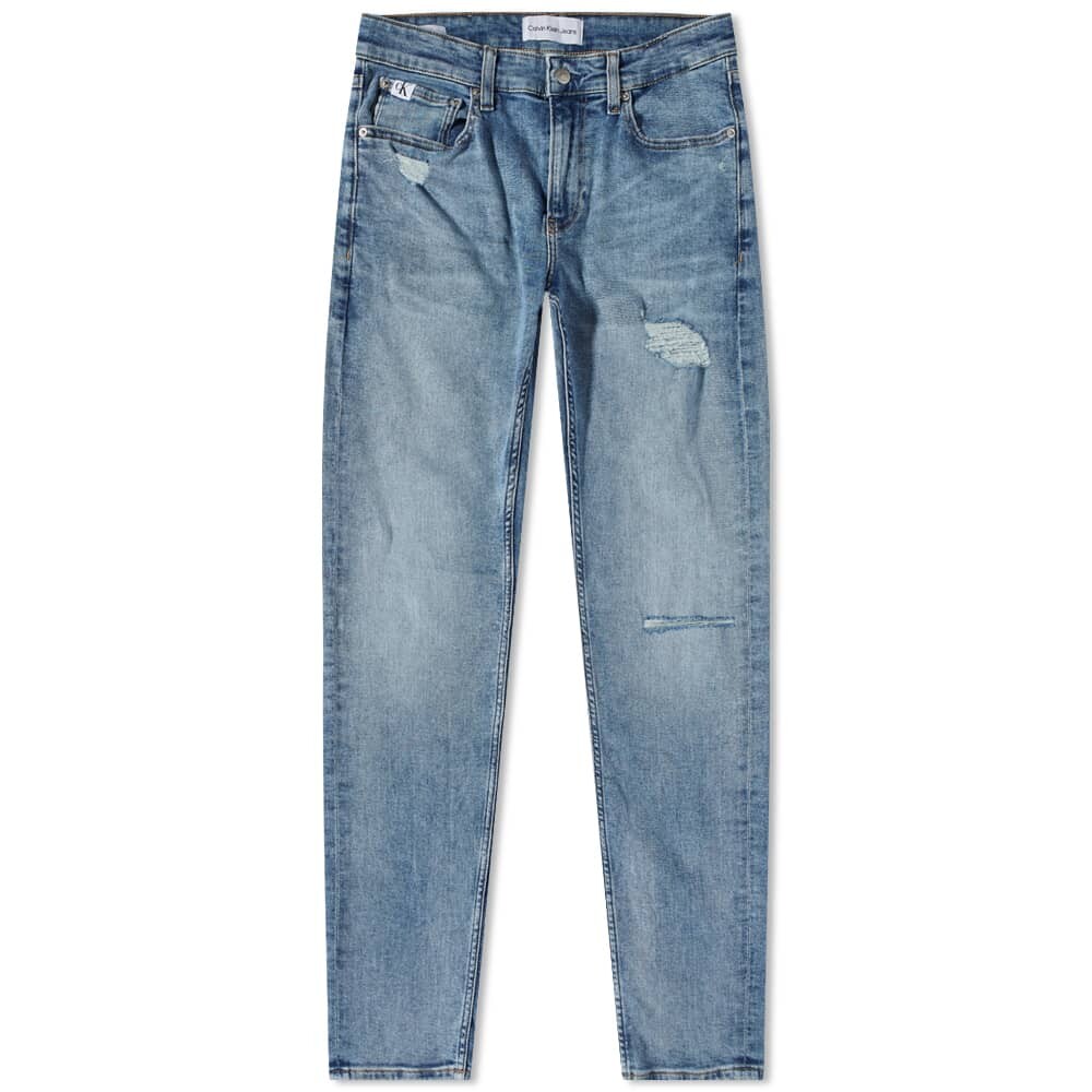 

Джинсы Calvin Klein Distressed Medium Wash Slim Taper Jean