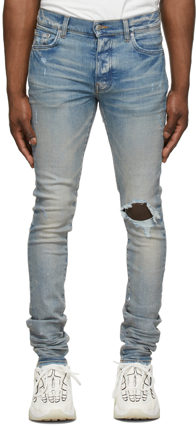 

Синие рваные джинсы AMIRI