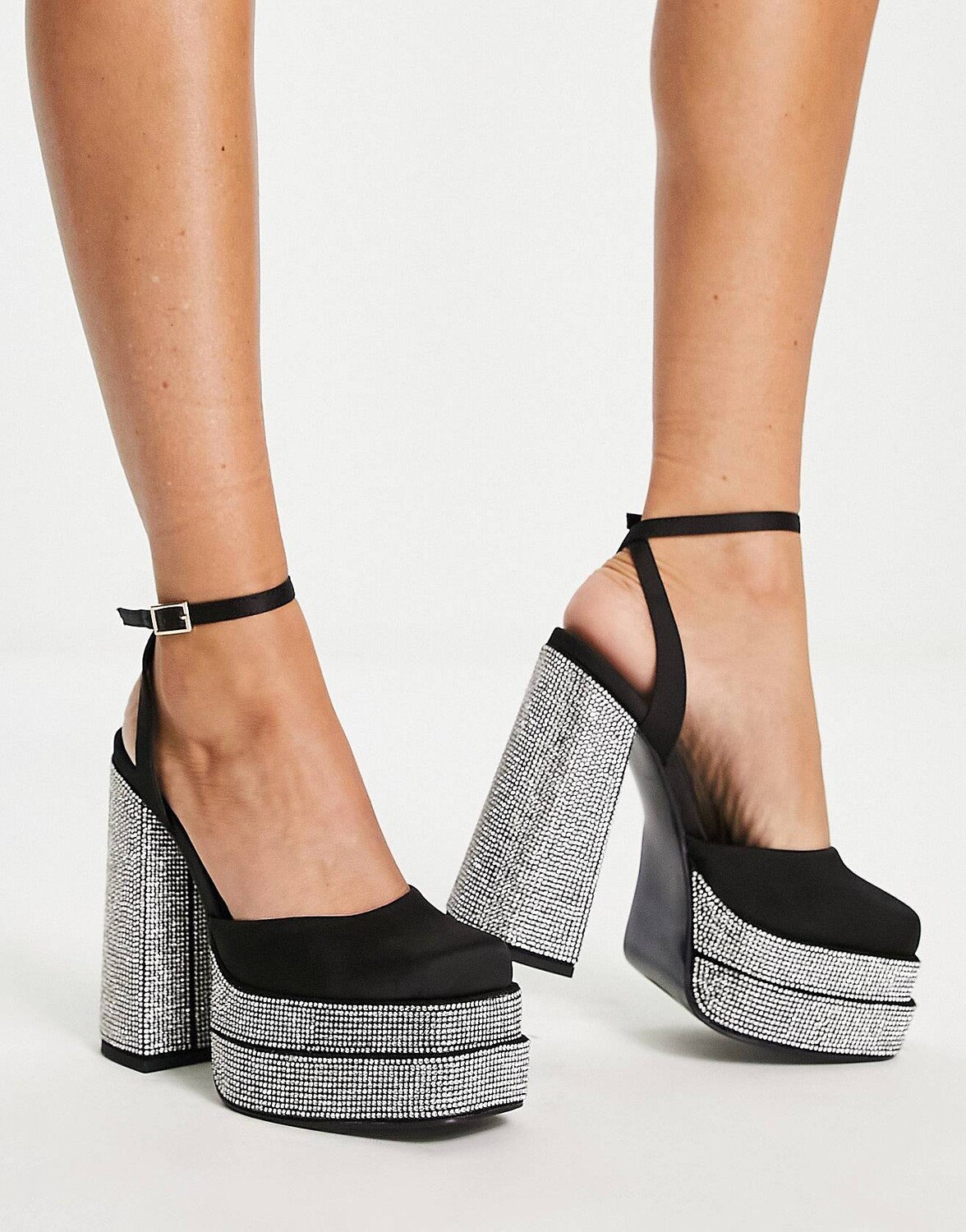 

Черные декорированные туфли на каблуке на платформе ASOS DESIGN Pluto