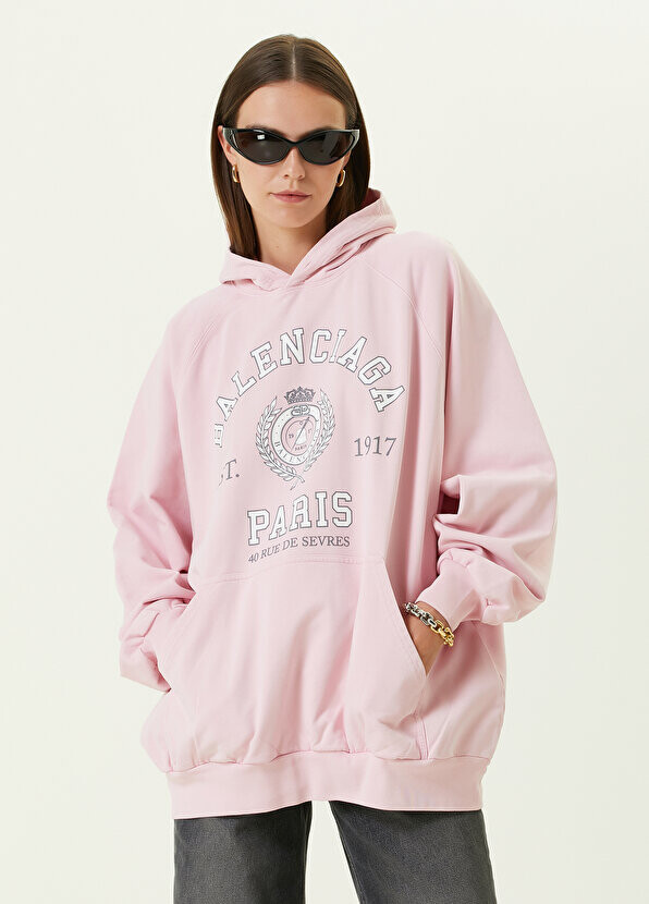 

Розовый свитшот с капюшоном и логотипом Balenciaga