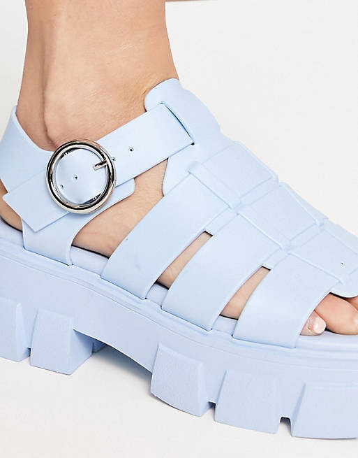 

Синие массивные сандалии на плоской подошве в рыбацком стиле ASOS DESIGN Finalist