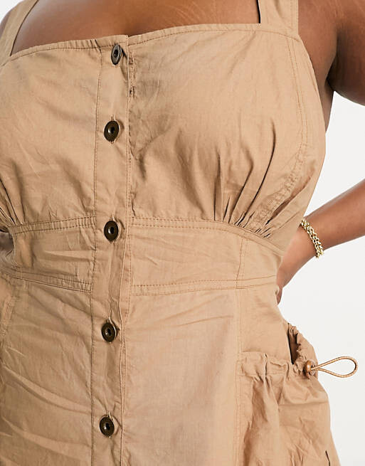 

Коричневое платье мини из стираного хлопка с пуговицами ASOS DESIGN Curve