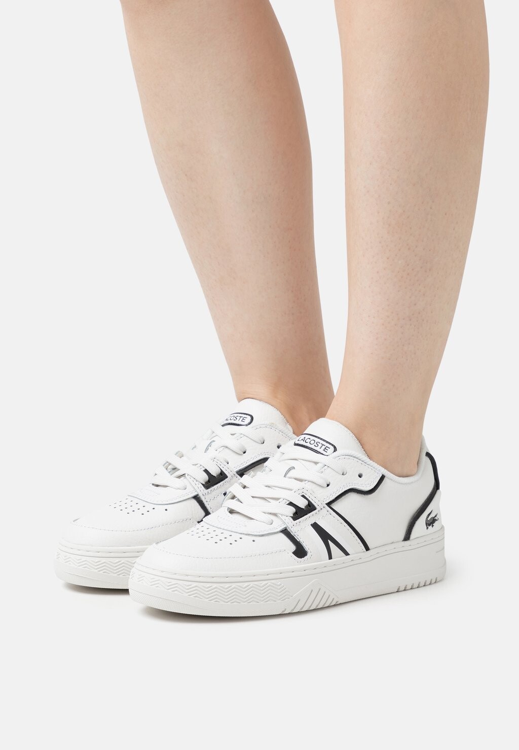 

Кроссовки Lacoste