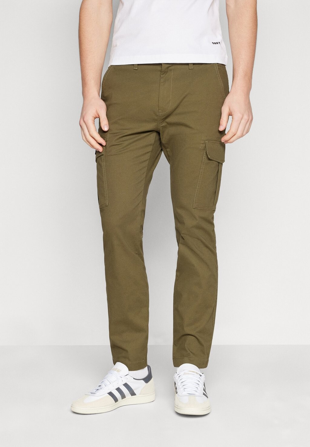 

Боевые брюки AUSTIN Tommy Jeans, оливковый