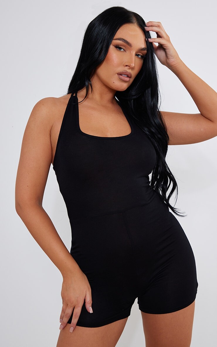 

PrettyLittleThing Черный комбинезон из джерси с вырезами и бретелькой на шее