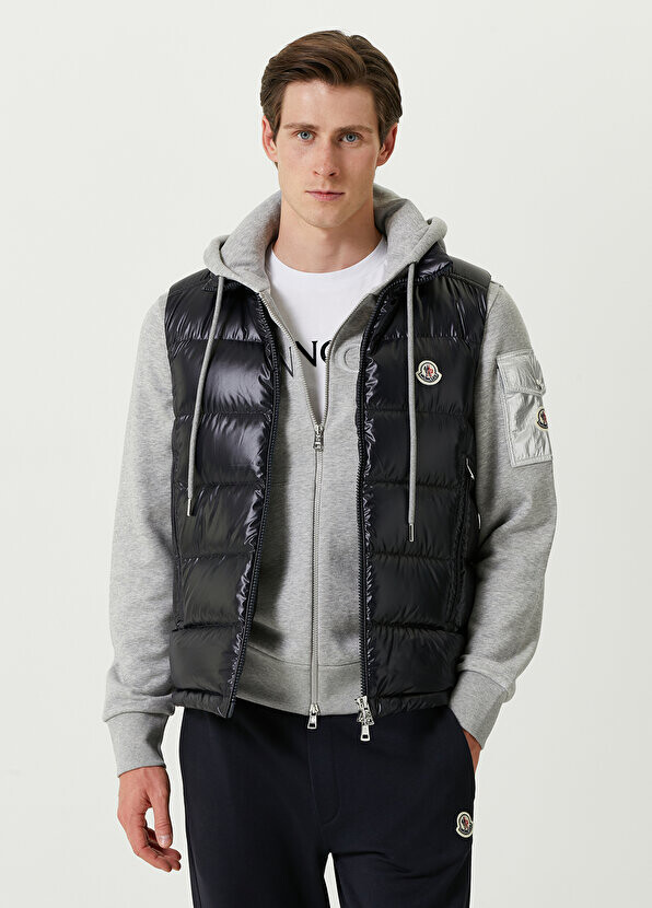 

Темно-синий стеганый жилет Moncler