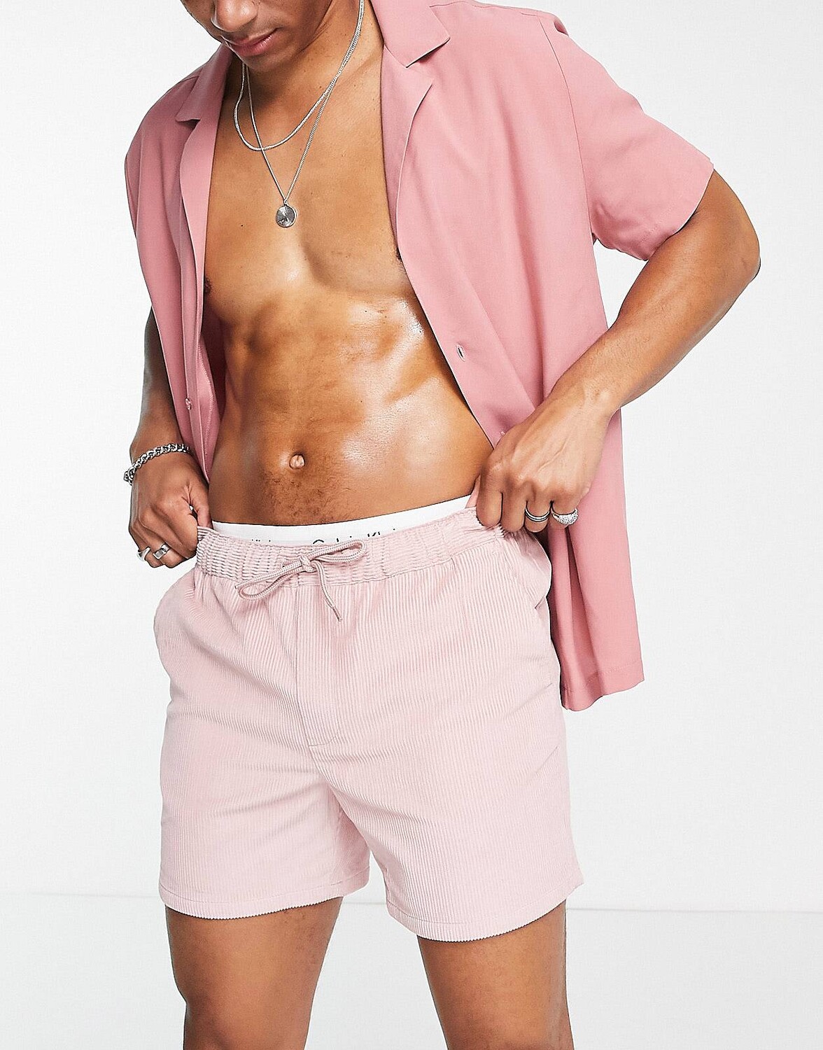

Розовые вельветовые шорты скинни ASOS DESIGN