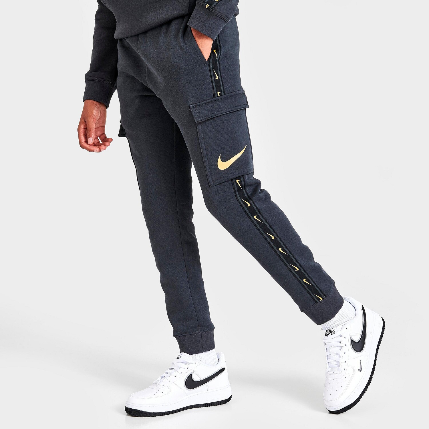 

Детские брюки карго из флиса Nike Sportswear Repeat, черный