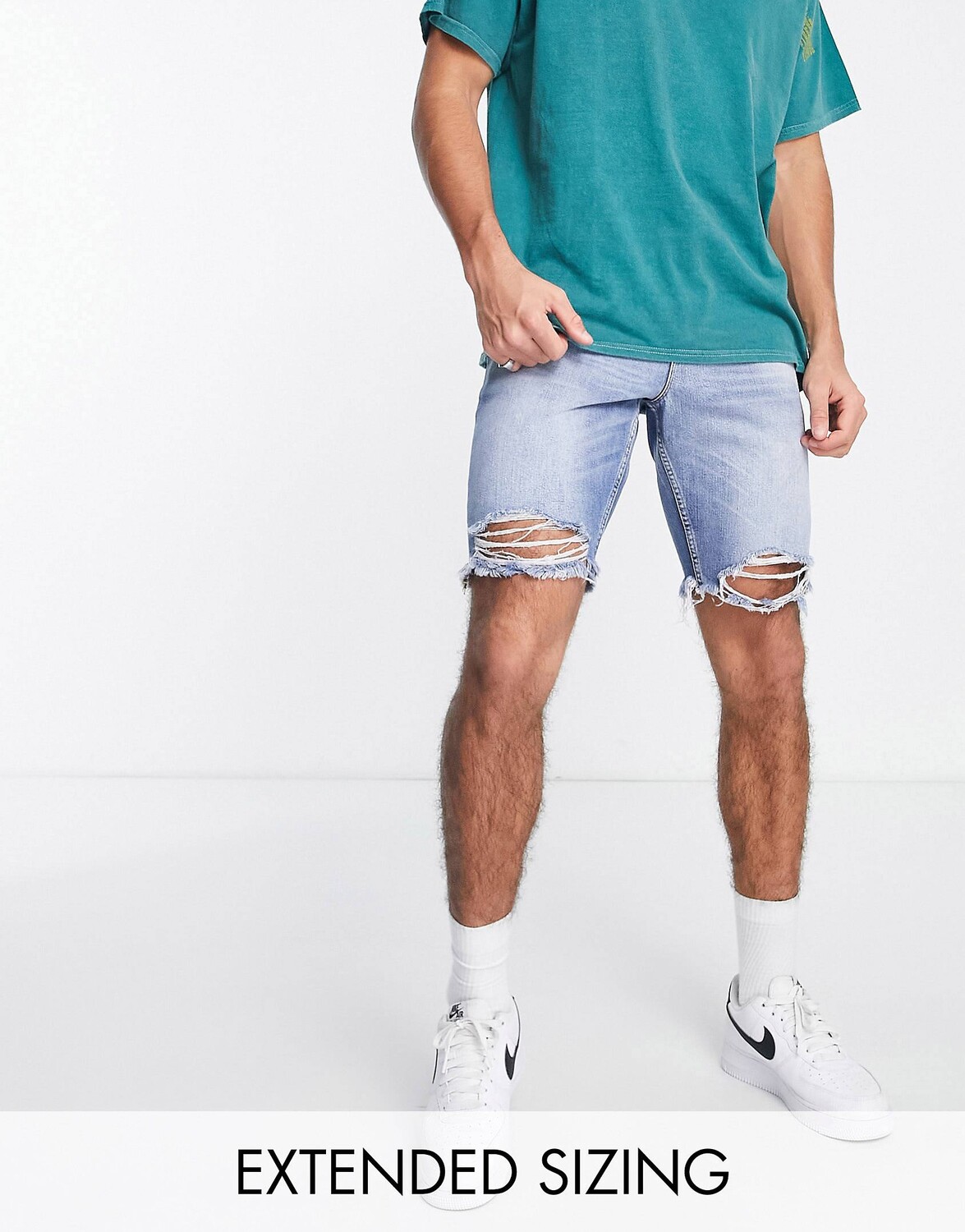

Синие джинсовые шорты облегающего кроя с необработанным краем ASOS DESIGN