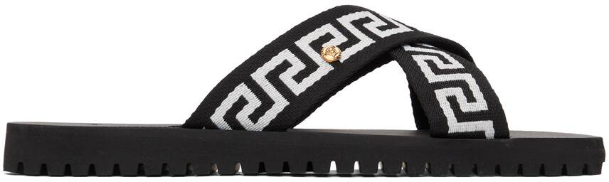 

Черно-белые сандалии Nastro Greca с перекрестными ремешками Versace