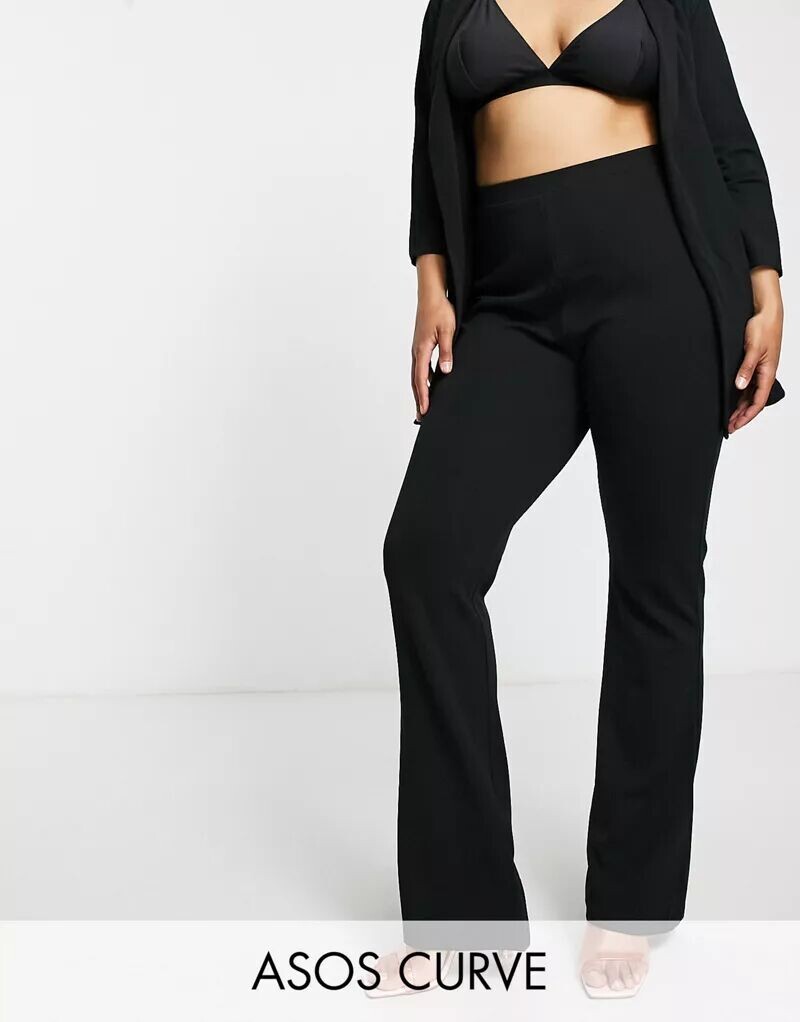 

Черные расклешенные брюки узкого кроя ASOS Curve