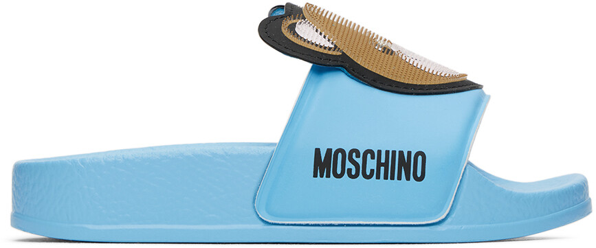 

Moschino Kids Синие шлепанцы с 3D принтом Teddy