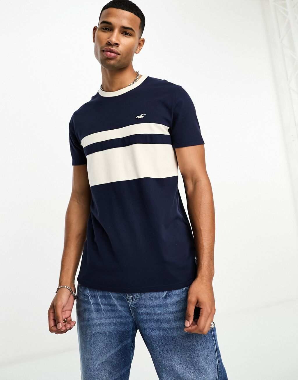 

Темно-синяя футболка из пике с полосками на груди и логотипом Hollister, Синий