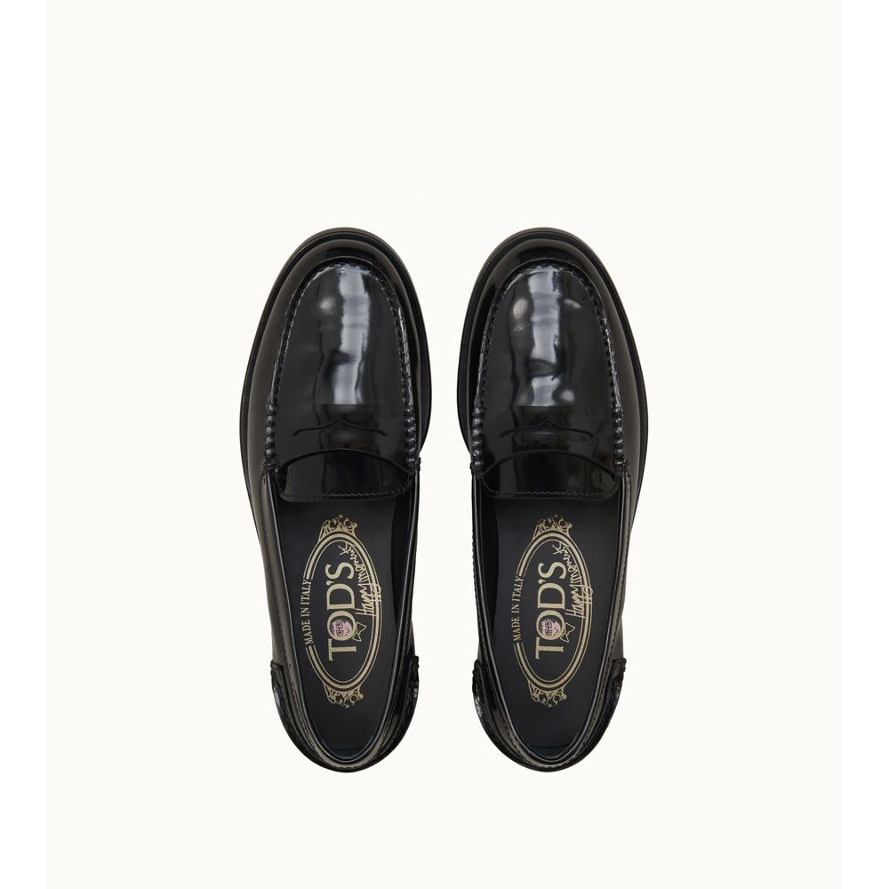

Лоферы из блестящей кожи TOD's, черный