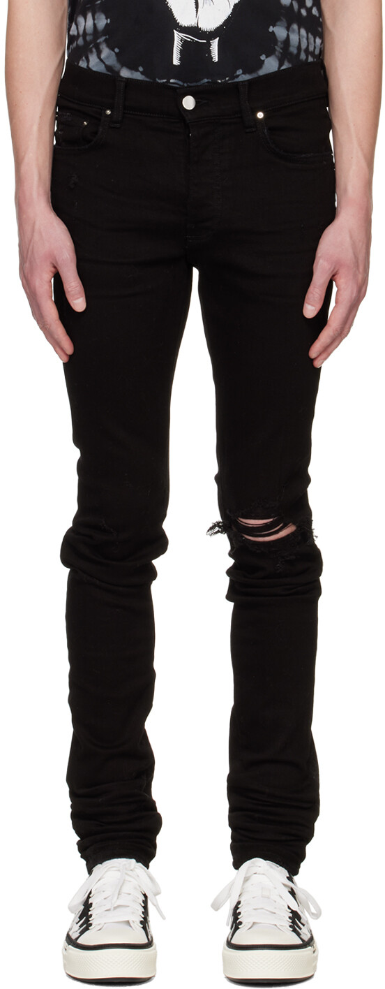 

Черные рваные джинсы AMIRI