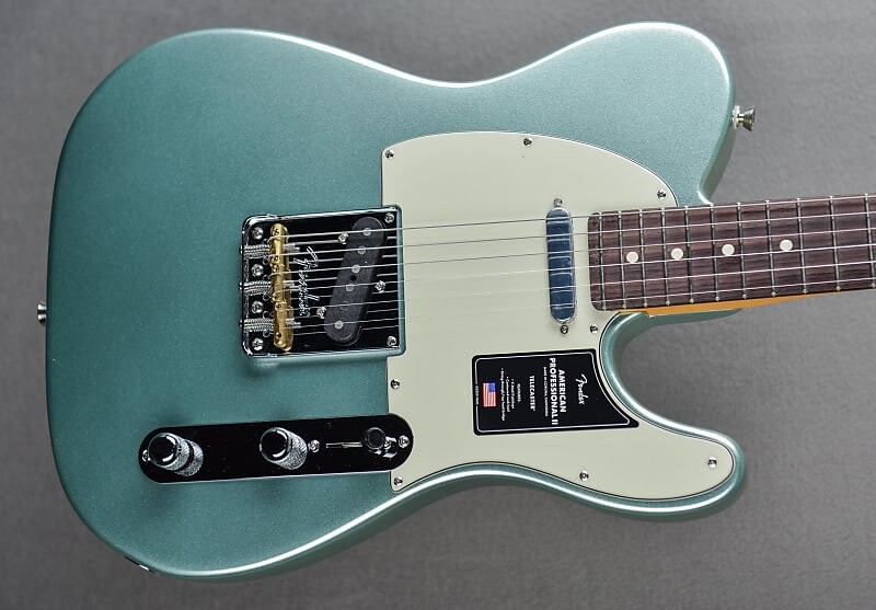 

Телекастер American Professional II - Mystic Surf Green с палисандровым покрытием Fender American Professional II Telecaster - w/Rosewood